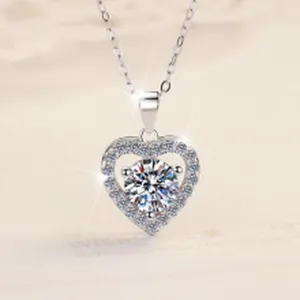 Close-up of a 1ct D color moissanite heart pendant necklace in 925 sterling silver.