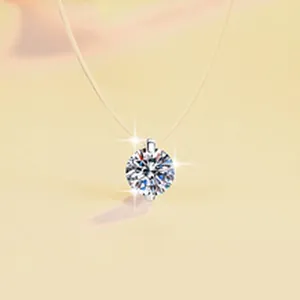 Macro shot of a sparkling 1 carat moissanite pendant with 6-prong silver setting.