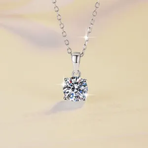 Close-up of 1-carat D-color Moissanite in a classic six-prong silver setting.