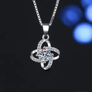 Detailed macro view of a 1 carat Moissanite flower pendant necklace in sterling silver