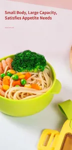 Detailed view of a bright green insulated baby food bowl filled with a nutritious pasta meal