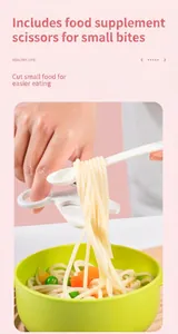 Practical white baby food scissors cutting noodles in a green bowl for toddlers