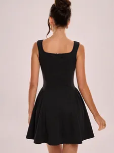 Detailed rear view of a slim-fit black sleeveless dress with a chic square neckline