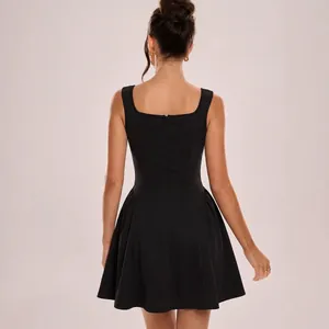 Elegant black sleeveless mini dress with square neckline, open back and pleated skirt