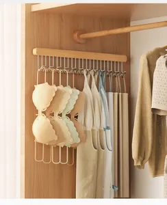 Cintre coulissant pour garde-robe organisant débardeurs et sous-vêtements dans placard