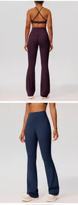 Detail view of high-waisted flared yoga pants in dark purple and navy blue colors
