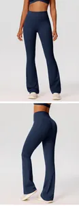 High-waisted flared yoga pants with scrunch butt lift detail in navy blue color.