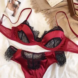 Elegant sexy red satin and black eyelash lace lingerie set with sheer patchwork bra