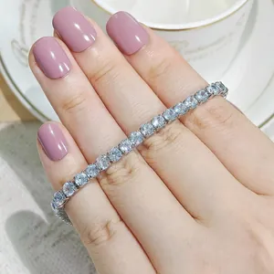 Luxurious silver tennis bracelet with sparkling cubic zirconia displayed on a hand
