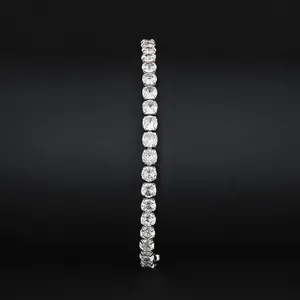 Detailed close-up of a sparkling silver-tone tennis bracelet with round cubic zirconia