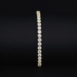 Elegant gold-plated tennis bracelet featuring sparkling round-cut cubic zirconia stones.