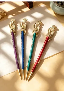 Close-up detail of retro peacock hairpins featuring colorful imitation cloisonné enamel patterns