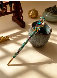 Detail of a vintage peacock hair stick with colorful enamel and rhinestones