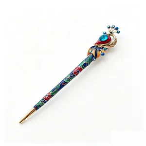 Vintage peacock hairpin with enamel detail and crystal for traditional hair styling.
