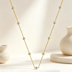 French minimalist gold necklace with sparkling crystal accents, stainless steel jewelry.