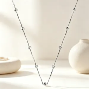 Elegant French minimalist silver stainless steel station necklace with crystal charms