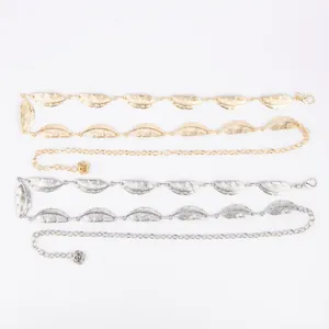 Bohemian leaf-shaped metal waist chain in gold and silver finishes.