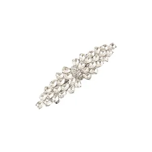 Close-up of elegant hair clip with sparkling pear-shaped clear zirconia crystals