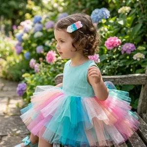 Close-up shot of a young girl wearing colorful glitter heart hair clips in a lush garden
