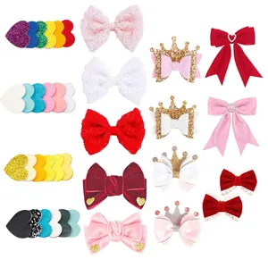 Assorted glitter heart and bow hair clips set for children on a white background.