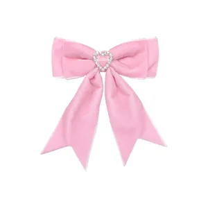 Élégante barrette nœud en velours rose ornée d'un cœur en strass pour petites filles
