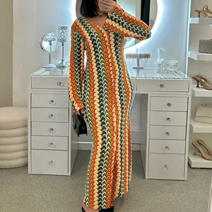 Slim V-neck long sleeve maxi dress with colorful geometric wave pattern in lifestyle setting