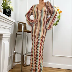 Women's V-neck long-sleeved knit maxi dress featuring a colorful zigzag pattern.