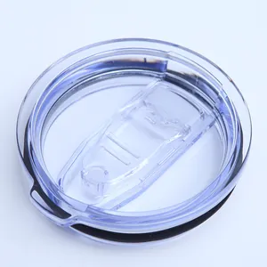 Close-up view of a transparent spill-proof lid for a 20oz travel tumbler cup