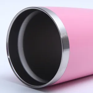 Detailed macro view of the smooth stainless steel rim of a pink 20oz insulated tumbler