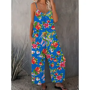 Vibrant blue floral wide-leg jumpsuit with spaghetti straps and pockets for summer.