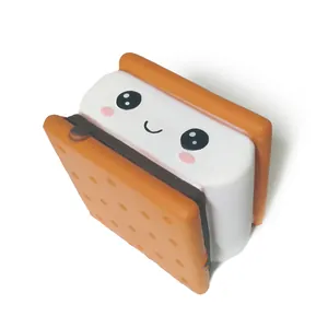 Detail view of cute cartoon face on squishy chocolate biscuit sandwich stress relief toy
