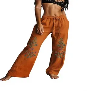 Pantalon large orange élégant avec broderie florale et cordon de serrage à la taille