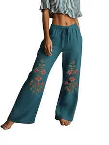 Pantalon large bleu sarcelle avec broderie florale et cordon de serrage réglable