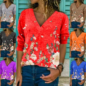 Women's casual V-neck long sleeve floral print top in multiple color options.