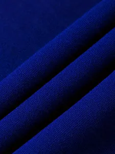 High-quality close-up detail of dark blue fleece fabric texture for men's trendy hoodies