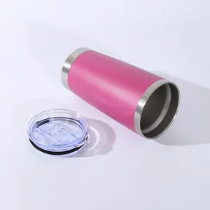 A 20oz pink stainless steel vacuum insulated tumbler with a transparent lid on white
