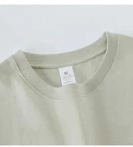 Detailed close-up view of a premium ribbed crew neck on a soft 230g cotton men's T-shirt