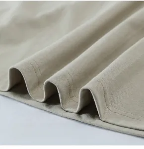 Detailed view of the neat double-strand stitching on a high-quality 230g men's T-shirt