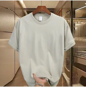 Close-up showing the soft fabric and loose fit of a 230g heavy cotton beige men's t-shirt