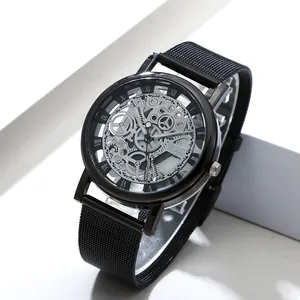 Close-up of a modern men's quartz watch with a skeleton dial and black mesh band.