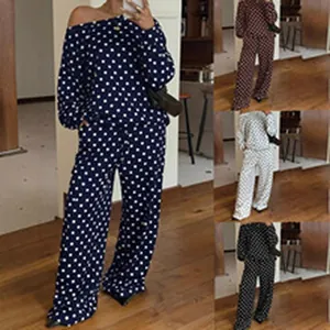 Chic women's polka dot loungewear set featuring off-shoulder top and wide pants