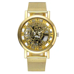 Detailed close-up of a stylish gold-toned skeleton quartz watch with a mesh strap.
