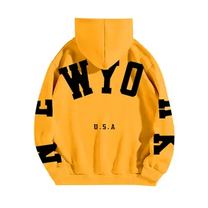 Premium yellow oversized fleece hoodie featuring bold black New York USA letter print