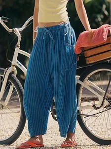 Blue striped cotton linen wide-leg pants with elastic waist and side pocket detail