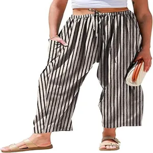 Detail view of women's striped cotton linen cropped pants with elastic waist and pockets