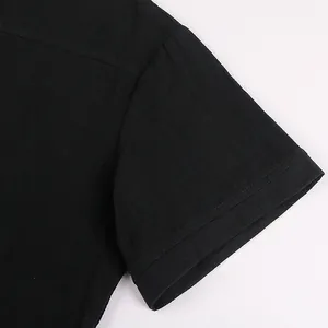 Detailed close-up of a black Renaissance style short sleeve shirt showing fabric texture