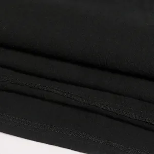 Macro close-up detail of black medieval renaissance shirt fabric and neat stitching