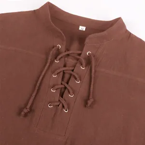 Close-up detail of a brown medieval renaissance shirt featuring a lace-up bandage neckline