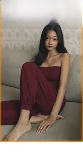 Lifestyle detail view of loose burgundy yoga harem pants for women's fitness and dance