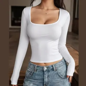 Detail of slim fit white long sleeve square neck T-shirt showcasing fabric and cut